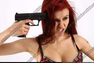 Nina Sitting Pose With Pistol Pose 